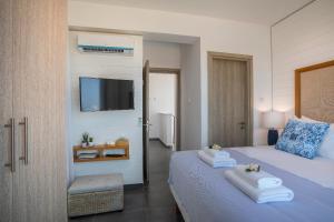 Ένα ή περισσότερα κρεβάτια σε δωμάτιο στο Chris Le Mare Luxury Villa +21 φωτογραφίες