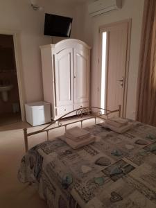 Postel nebo postele na pokoji v ubytování B&b Giadà