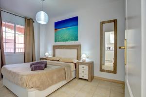 Postel nebo postele na pokoji v ubytování Your Ocean Suite