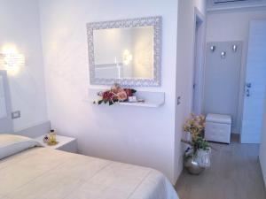 Postel nebo postele na pokoji v ubytování Hotel Sirena - Servizio spiaggia inclusive