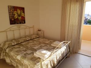 Postel nebo postele na pokoji v ubytování B&b Giadà