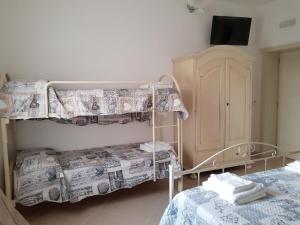 Postel nebo postele na pokoji v ubytování B&b Giadà