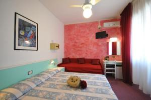 Postel nebo postele na pokoji v ubytování Hotel Fortuna