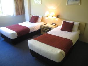 Postel nebo postele na pokoji v ubytování Devere Hotel