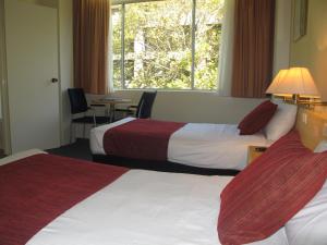 Postel nebo postele na pokoji v ubytování Devere Hotel