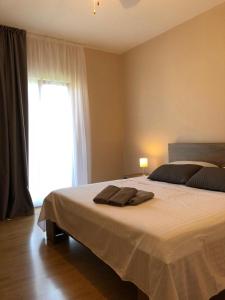 Postel nebo postele na pokoji v ubytování Bed & Breakfast Kurtic