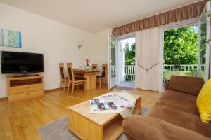 A television and/or entertainment centre at Residence Diana