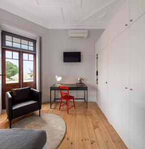 TV a/nebo společenská místnost v ubytování Penedo da Saudade Suites & Hostel