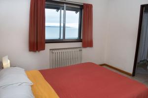 Postel nebo postele na pokoji v ubytování Hostel Inn Bariloche