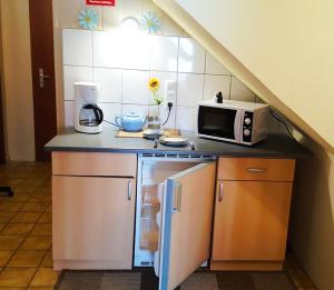 Nhà bếp/bếp nhỏ tại Ferienwohnung Kastanienblick mit Wlan