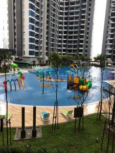 a large water park with a water slide at Atlantis Residence in Melaka