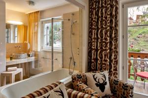 Koupelna v ubytování Dolomit Boutique Hotel