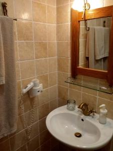 Kopalnica v nastanitvi Nimbus Guesthouse