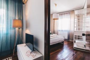 A bed or beds in a room at Zumalakarregi Apartment by People Rentals