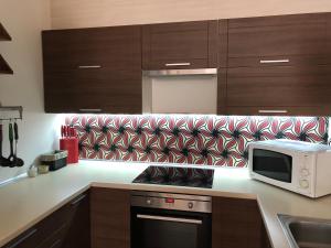 Kuchyň nebo kuchyňský kout v ubytování Apartman c.8 Magnolie