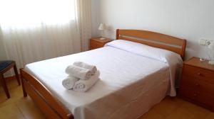 A bed or beds in a room at La Caseta del Pitxo