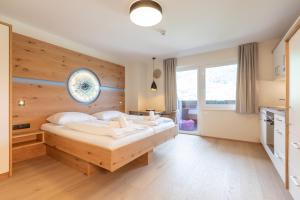 Postel nebo postele na pokoji v ubytování ''die Bergerin'' | Appartements Schladming