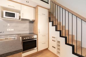 Kuchyň nebo kuchyňský kout v ubytování ''die Bergerin'' | Appartements Schladming