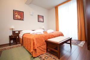 Posteľ alebo postele v izbe v ubytovaní Hotel Słoneczny Młyn