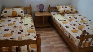 Voodi või voodid majutusasutuse Apartments & Rooms Vitko toas