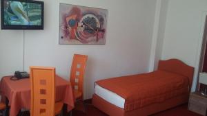 Postel nebo postele na pokoji v ubytování Hotel Am Ufer