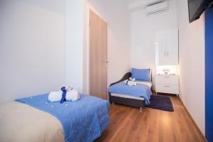 Postel nebo postele na pokoji v ubytování VisitZagreb Topaz&Sapphire
