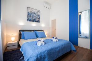Postel nebo postele na pokoji v ubytování VisitZagreb Topaz&Sapphire