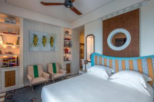 Ліжко або ліжка в номері Capri Tiberio Palace - The Leading Hotels of the World