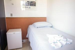 Postel nebo postele na pokoji v ubytování Pousada Rio Branco Nova Lima