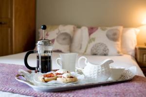 Ένα ή περισσότερα κρεβάτια σε δωμάτιο στο Brennan's Accommodation Glenties