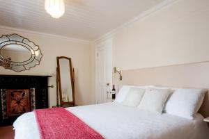 Ένα ή περισσότερα κρεβάτια σε δωμάτιο στο Brennan's Accommodation Glenties