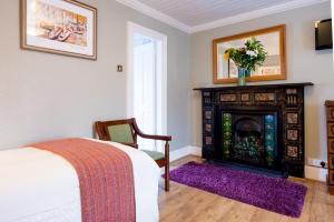 Ένα ή περισσότερα κρεβάτια σε δωμάτιο στο Brennan's Accommodation Glenties