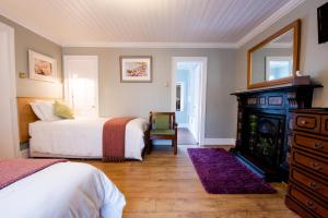 Ένα ή περισσότερα κρεβάτια σε δωμάτιο στο Brennan's Accommodation Glenties