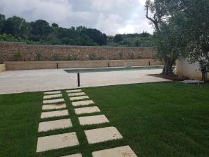 The swimming pool at or close to Casale Donna Rosa