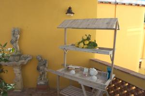 a shelf with fruit on it in a room at La Terrazza sul Mare in Capri