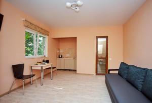 Kuchyň nebo kuchyňský kout v ubytování Hotel Fusion