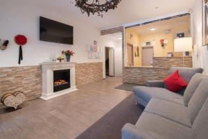 TV a/nebo společenská místnost v ubytování Best Western Plus Schwarzwald Residenz