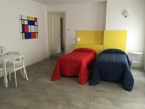 Postel nebo postele na pokoji v ubytování Stile Libero