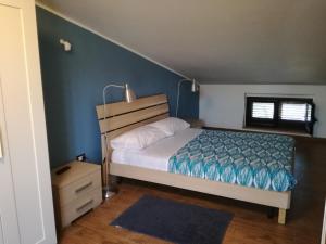 Postel nebo postele na pokoji v ubytování villa peppino