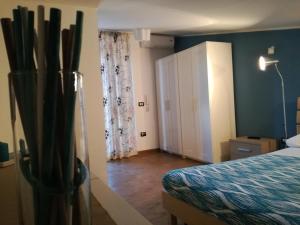 Postel nebo postele na pokoji v ubytování villa peppino