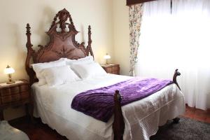 Postel nebo postele na pokoji v ubytování Graciosa Guest House