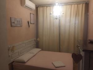 Posteľ alebo postele v izbe v ubytovaní Loft a pochi passi dal mare