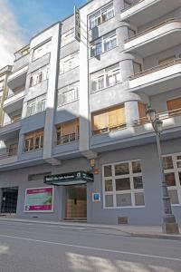 a building on the side of a street at Hotel Alda Centro Ponferrada in Ponferrada