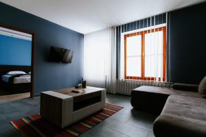 TV a/nebo společenská místnost v ubytování Hotel Mátrix