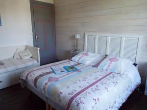 Postel nebo postele na pokoji v ubytování Villa Tranquillité