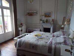Postel nebo postele na pokoji v ubytování Villa Tranquillité