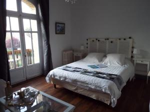 Postel nebo postele na pokoji v ubytování Villa Tranquillité