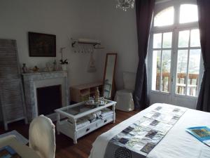 Postel nebo postele na pokoji v ubytování Villa Tranquillité