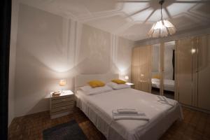 Postel nebo postele na pokoji v ubytování Apartment D&A