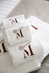 Fotografie z fotogalerie ubytování aMarti Suites B&B v destinaci Santo Stefano di Magra + 37 fotografií